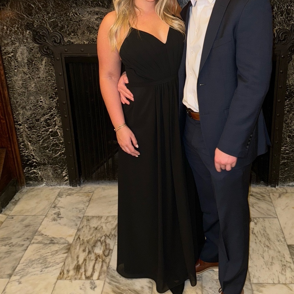Fame and Partners black floor length bridesmaid dress.